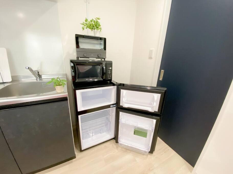 Residential Hotel Glitter Usjまで1駅5分 Osaka Bilik gambar