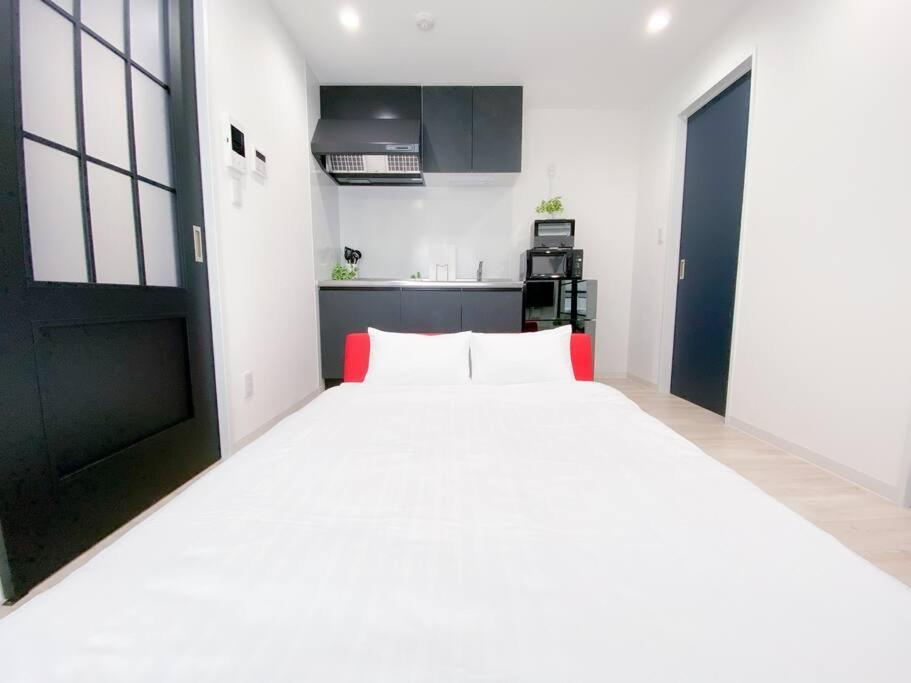 Residential Hotel Glitter Usjまで1駅5分 Osaka Bilik gambar